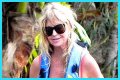 Goldie Hawn Rocks a Red Swimsuit at Age 67, Feeds Dolphins With Kurt Russell