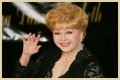 How Fred Astaire Helped Debbie Reynolds Get Over Gene Kelly's Criticisms of Her Dancing